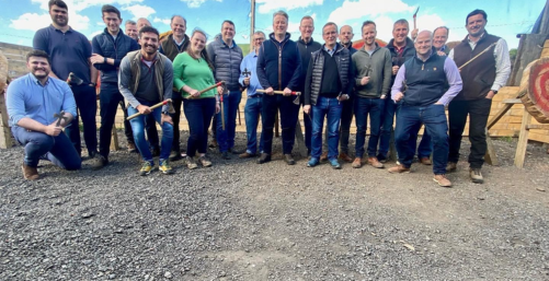 Corporate team building group with activity equipment at Yorkshire Activity Centre
